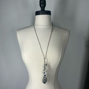 Long silver celtic tassel statement necklace